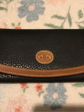 Pebbled Black Wallet with Tan Trim and Logo Patch